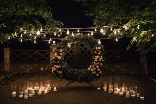 Beautiful Photozone With Big Wreath Decorated With Greenery Roses Centerpiece Candles Sides Garland Hanged Trees